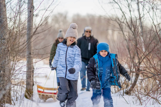 istock Family walking in forest 1301881740