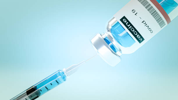 istock 3d  render. covid-19 coronavirus vaccine bottle vaccination. 1301885654