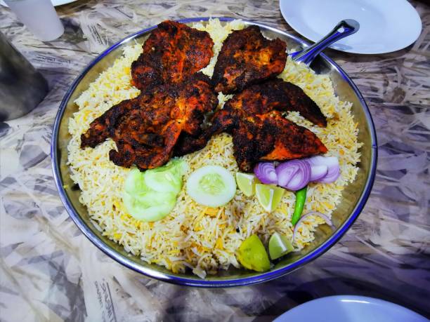 istock Mandi Rice with grilled chicken 1301887442