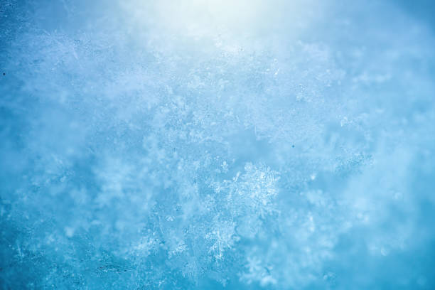 istock Macro background of fresh snowflake texture 1301891347