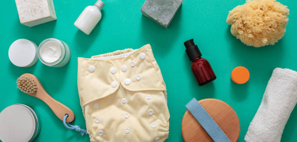 istock Baby bathing and cloth diaper changing products background, top view 1301895586