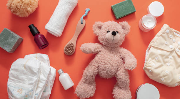 istock Baby bathing and diaper changing products background, top view 1301895595