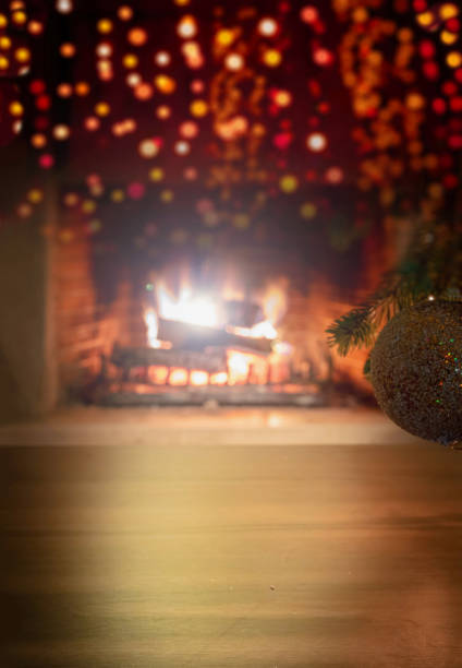 istock Xmas at home. Bokeh blur burning fireplace background. Copy space. 1301895598