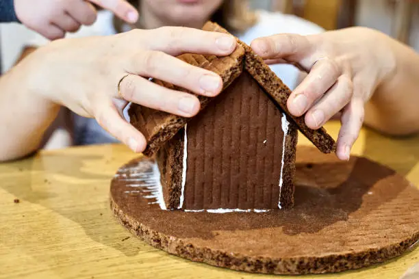 Making gingerbread house before christmas time