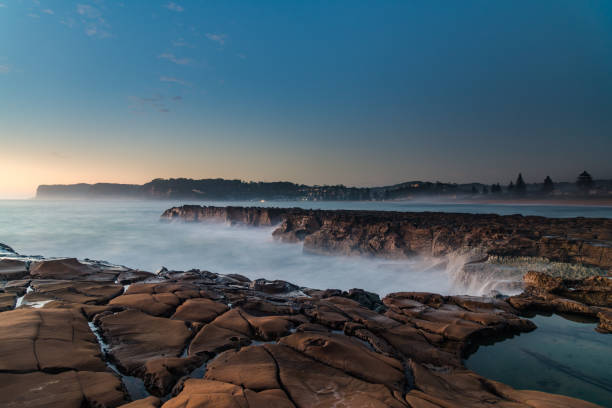 istock Early Morning Seascape from Rock Platform 1301903595