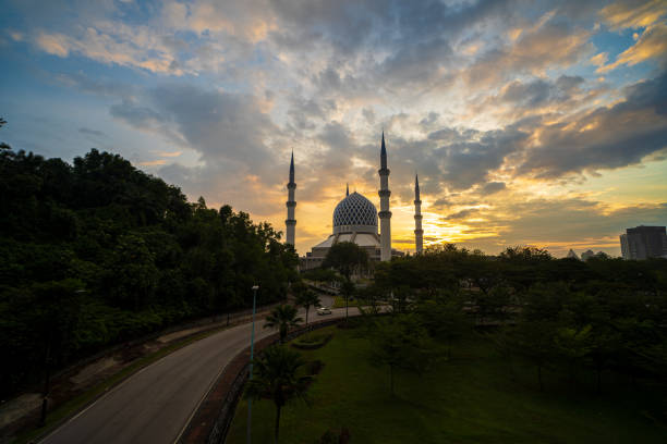 istock Scenery sunrise view of blue mosque shah alam 1301906440