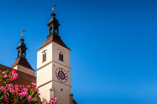 istock clock tower of Neupfarrkirche in Regensburg 1301909291