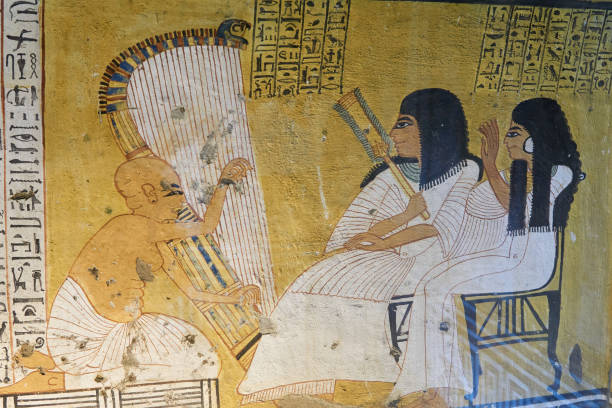 A Harpist Scene from Ancient Egypt A wall scene with a harpist from the tomb of Inherkhau (TT 359), Thebes, Luxor - Egypt egyptian art stock pictures, royalty-free photos & images