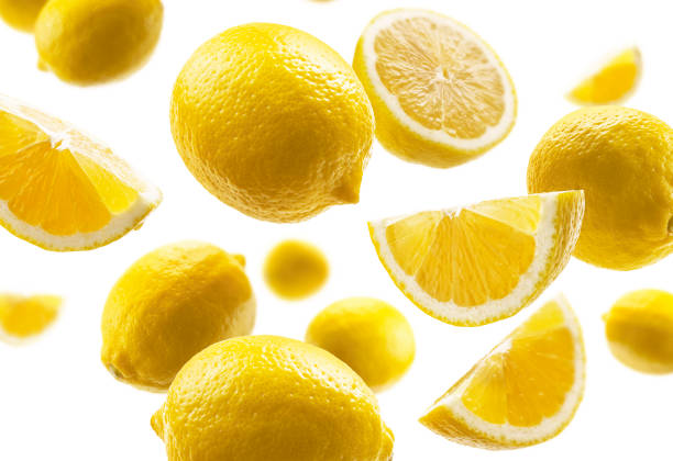 istock Yellow lemons levitate on a white background 1301911799