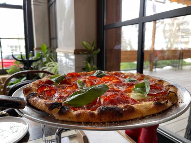 istock pizza with salami and cheese 1301916073