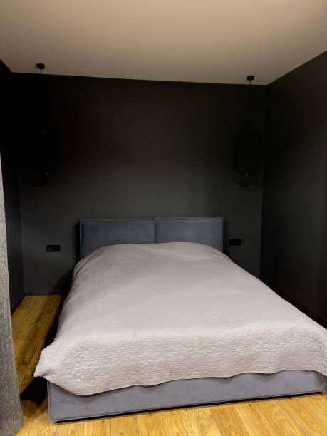 istock hotel room with bed 1301916181
