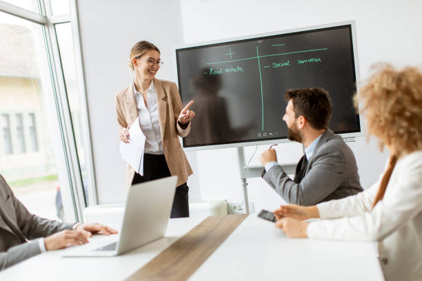 istock Multiethnic business people working together in the office 1301919783