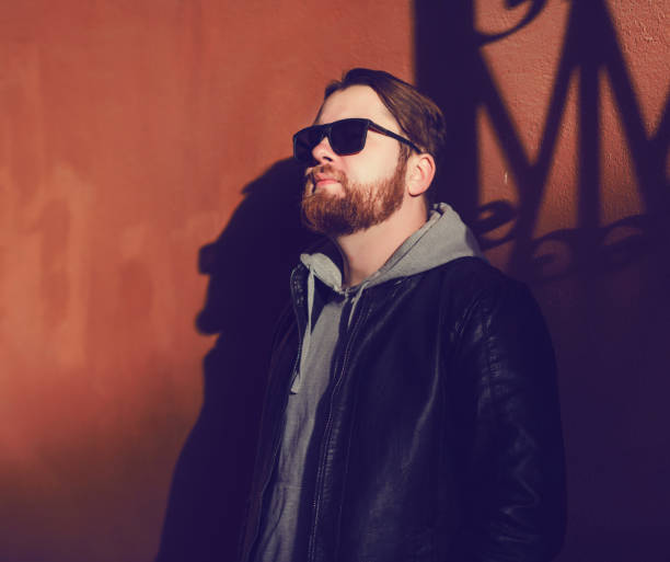 istock stylish bearded man in a leather jacket 1301919933