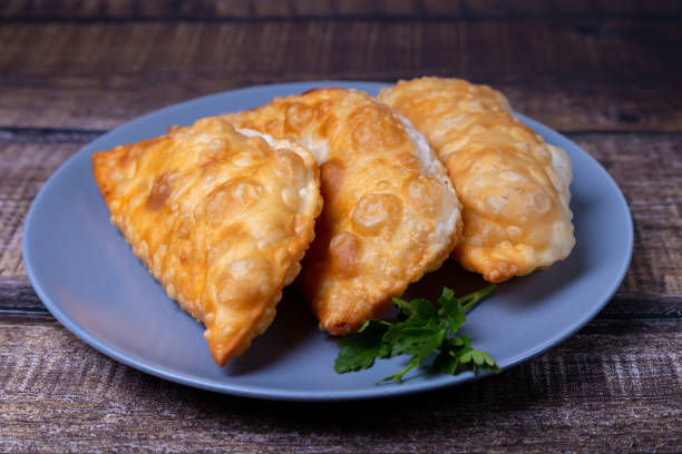 istock Chebureks with meat. Flat patty, deep-fried. A traditional dish. 1301923614