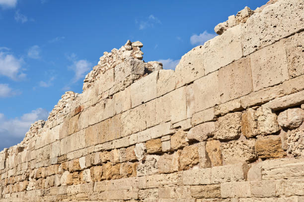 istock fragment of a destroyed antique fortress wall with masonry from different centuries against the sky 1301925618