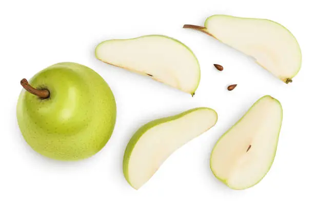 Photo of Green pear fruit with slices isolated on white background with clipping path. Top view. Flat lay