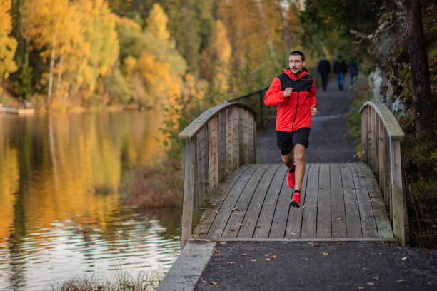 istock One lonely man exercising in nature. 1301925630