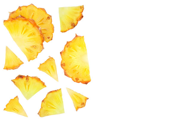 istock pineapple slices isolated on white background . Top view with copy space for your text. Flat lay 1301926751