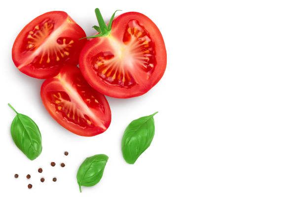 istock Tomato slices with basil leaf isolated on white background. Clipping path. Top view with copy space for your text. Flat lay 1301926841