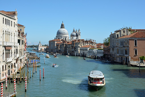 Grand canal with view of the Basilica Santa Maria della Salute of San Marco in Venice - Italy.