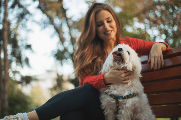 istock woman with dog 1301930259