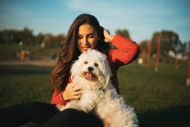 istock woman with dog 1301930309