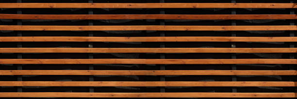 istock panorama wooden planks on black wall background 1301931438