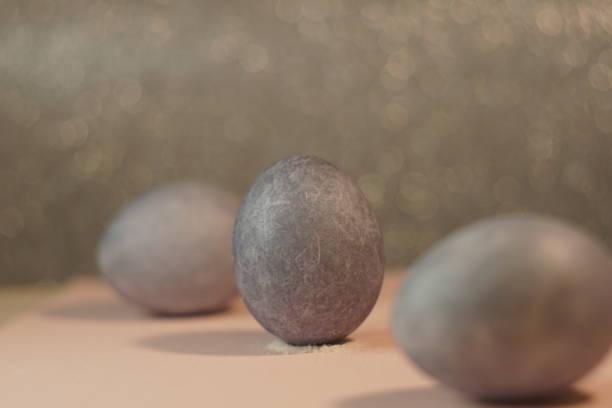 istock stylish gray marble eggs painted for easter, place for text 1301935930