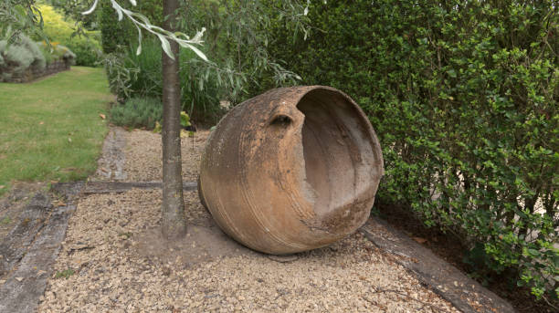 istock Antique wine jug under the tree 1301939435