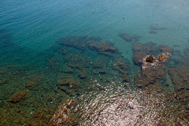 Seascape. Coastal cliffs almost completely hidden under water