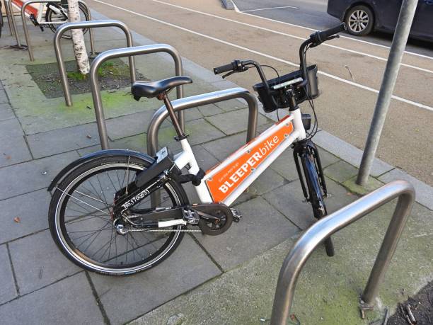 Rental bike Dublin, Ireland, 2nd January 2021. Bleeperbike rental electric bike rack in Blackrock Village bicycle docking station stock pictures, royalty-free photos & images