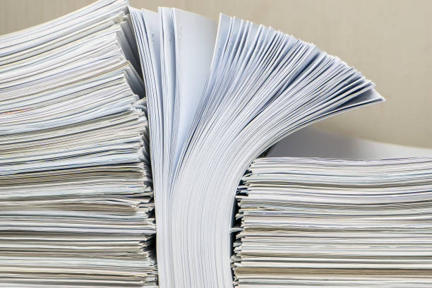 istock pile of paper documents in the office 1301946214