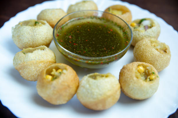 Homemade Panipuri, Golgappe. Popular Nepali Indian Street Snacks Pani Puri Is A Popular Street Snack Of India .Pani Puri or panipuri, Golgappe or gol gappe, Chat item, Nepali style Homemade Panipuri panipuri stock pictures, royalty-free photos & images