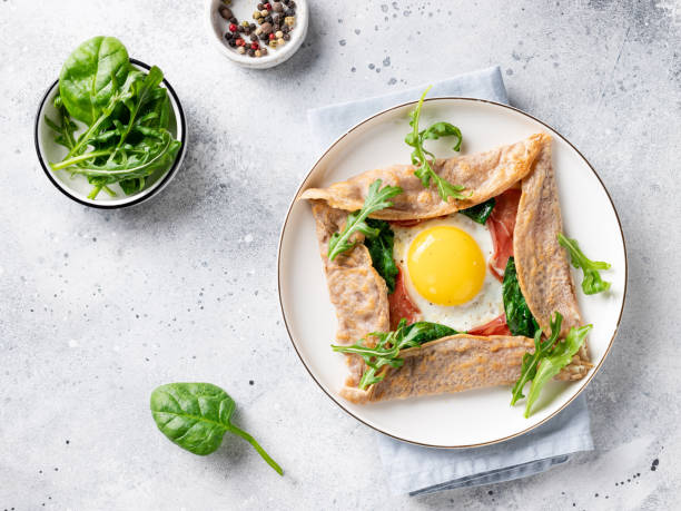 istock buckwheat crepe with egg, prosciutto and spinach 1301949804