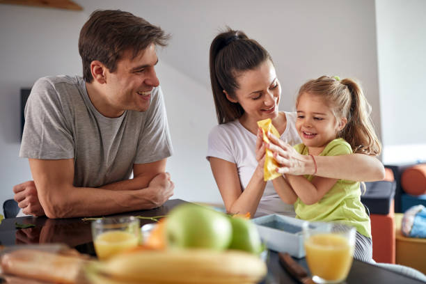 istock Jolly parents playing together with their daughter 1301950520