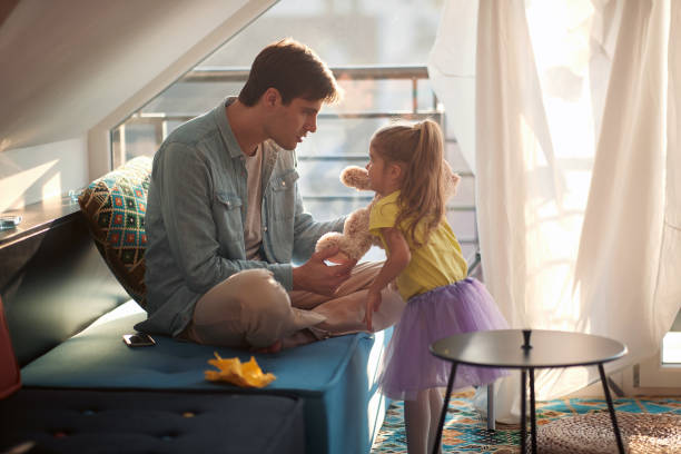istock Caucasian father and daughter playing together 1301950946