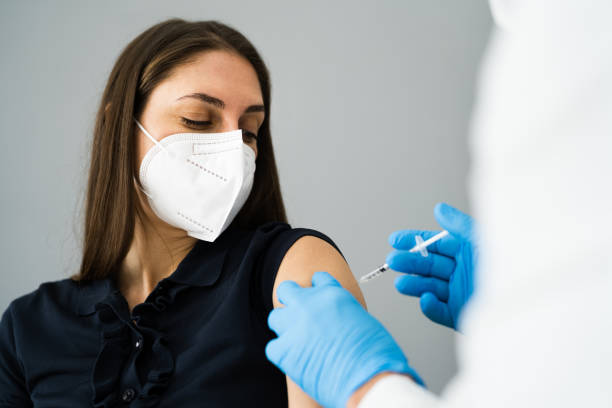 istock Covid Vaccine Injection By Doctor 1301956331