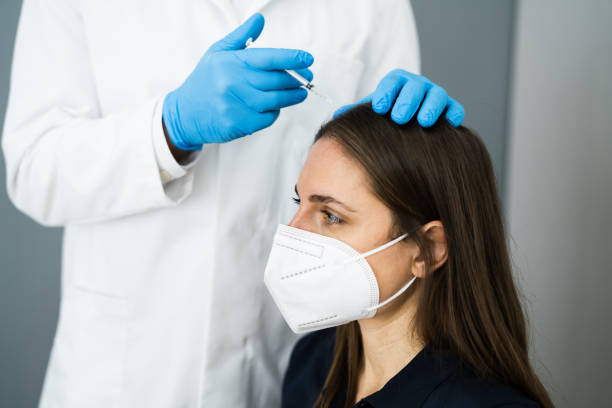 istock Hair Therapy Injection By Doctor Using Syringe 1301956332