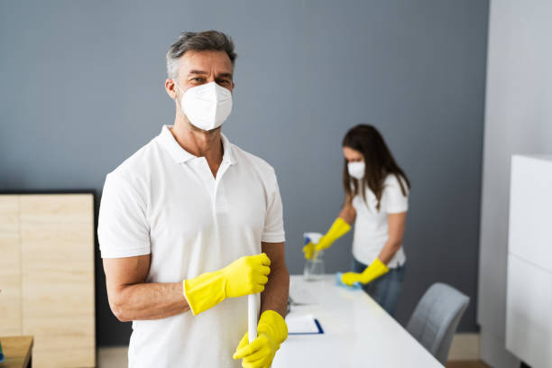 istock Cleaning Service Janitor Near Desk 1301956431
