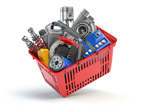 Car parts and auto spare in shopping basket isolated on white. 3d illustration