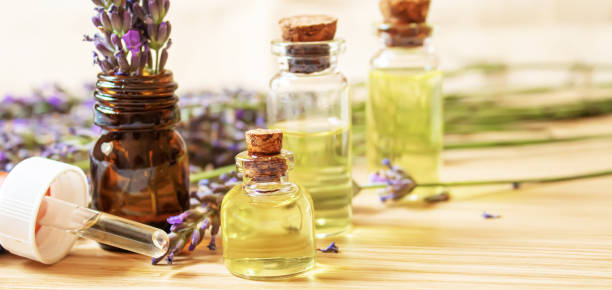 istock Lavender essential oil in a small bottle. Selective focus. 1301959054