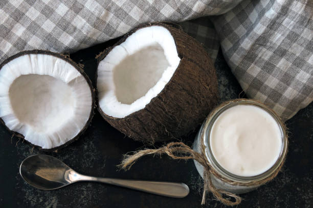 istock Coconut milk in jars. Vegan milk. 1301960443