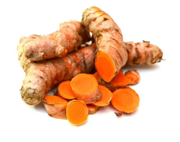 istock fresh turmeric roots and cut slices on white 1301961739