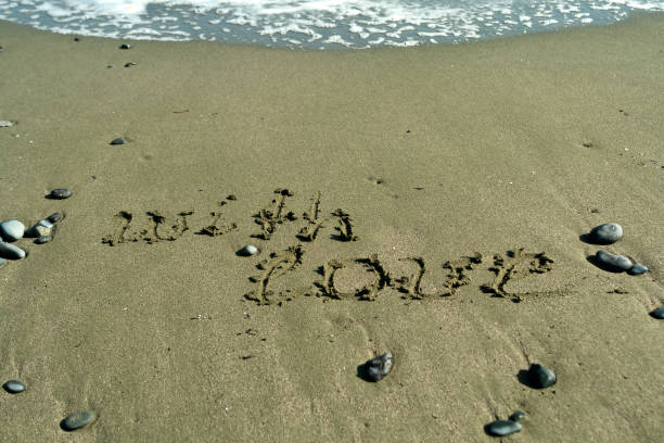 istock Words With Love on beach sand 1301962501