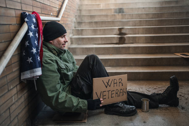 istock American war veteran begging on the street 1301962665