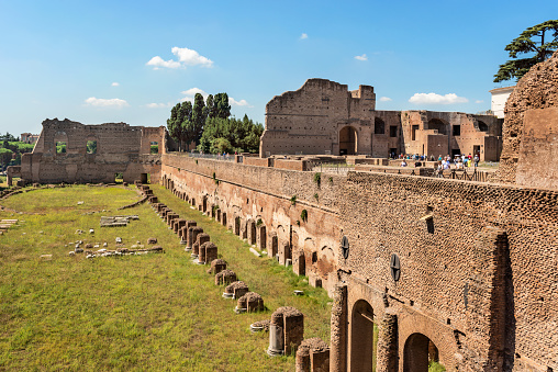 Rome, Italy - August 29, 2015: Tourists visiting Old stadium located on Palatine Hill in Rome, Italy.