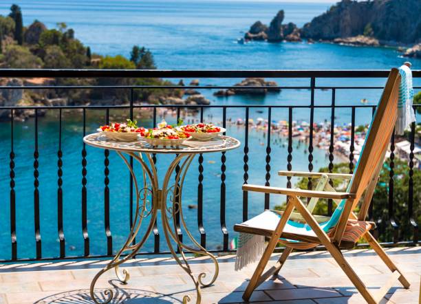 Italian lunch Exquisite Sicilian pasta served on a sun terrace with incredible sea view sicily photos stock pictures, royalty-free photos & images