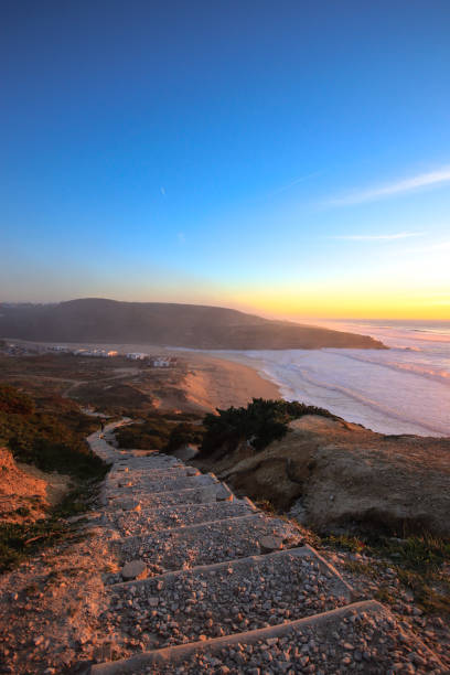 istock Amazing sunset in a beach with the ocean in background. 1301967465