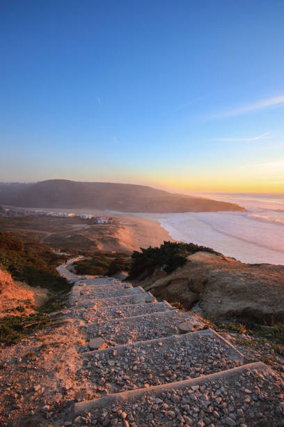 istock Amazing sunset in a beach with the ocean in background. 1301967478