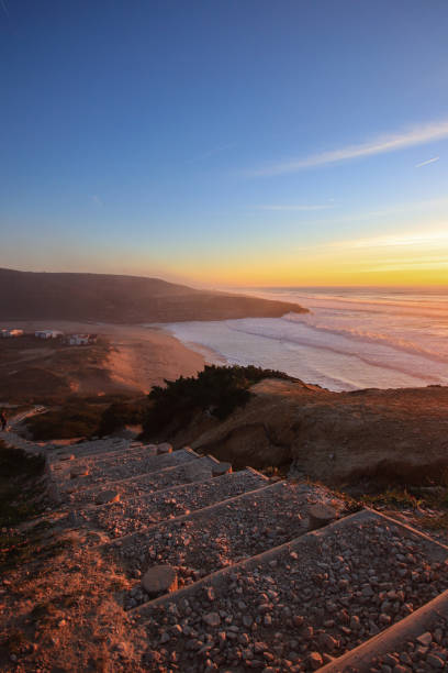istock Amazing sunset in a beach with the ocean in background. 1301967482